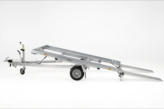 Debon small car transporter trailer tilted up with ramps down