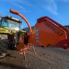 Tractor-mounted wood chipper by Timberwolf