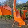 Tractor-mounted wood chipper by Timberwolf