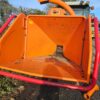 Tractor-mounted wood chipper by Timberwolf