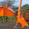 Tractor-mounted wood chipper by Timberwolf