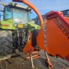 Tractor-mounted wood chipper by Timberwolf