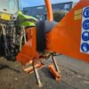 Tractor-mounted wood chipper by Timberwolf