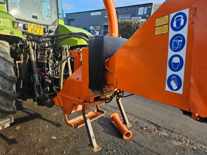 Tractor-mounted wood chipper by Timberwolf