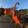 Tractor-mounted wood chipper by Timberwolf