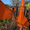Tractor-mounted wood chipper by Timberwolf