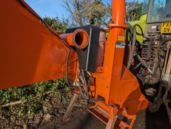 Tractor-mounted wood chipper by Timberwolf