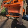 Tractor-mounted wood chipper by Timberwolf