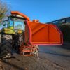 Tractor-mounted wood chipper by Timberwolf