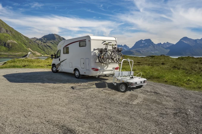 Debon Roadster Camp Transverse Motorcycle Trailer behind a motorhome / camper van