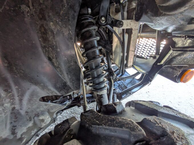 Suspension spring detail on Suzuki KingQuad 4x4 500 AXi